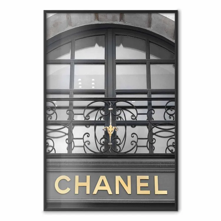 Golden Signboard - golden inscription on black architectural building with window