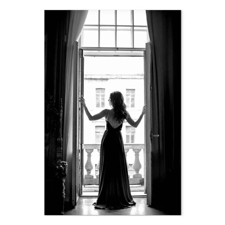 Woman in window - black and white photograph with woman silhouette