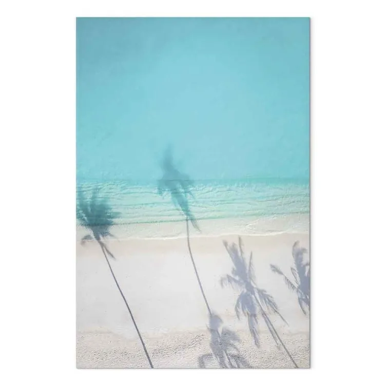 Turquoise coast - marine beach with white sand in the shade of palm