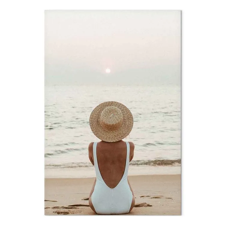 Woman in hat on the beach - Marine landscape with sunset