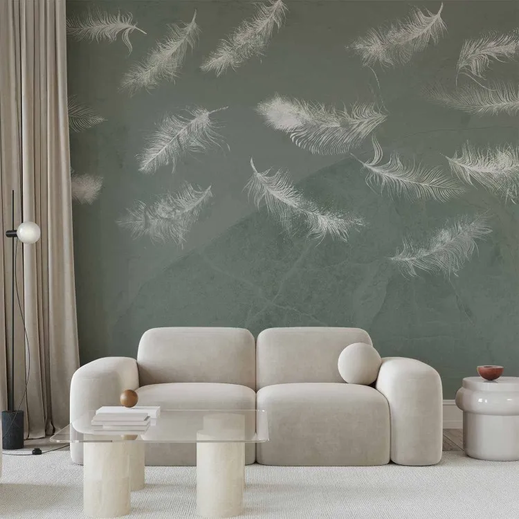 In flight - white feathers carried by the wind on an olive background with pattern