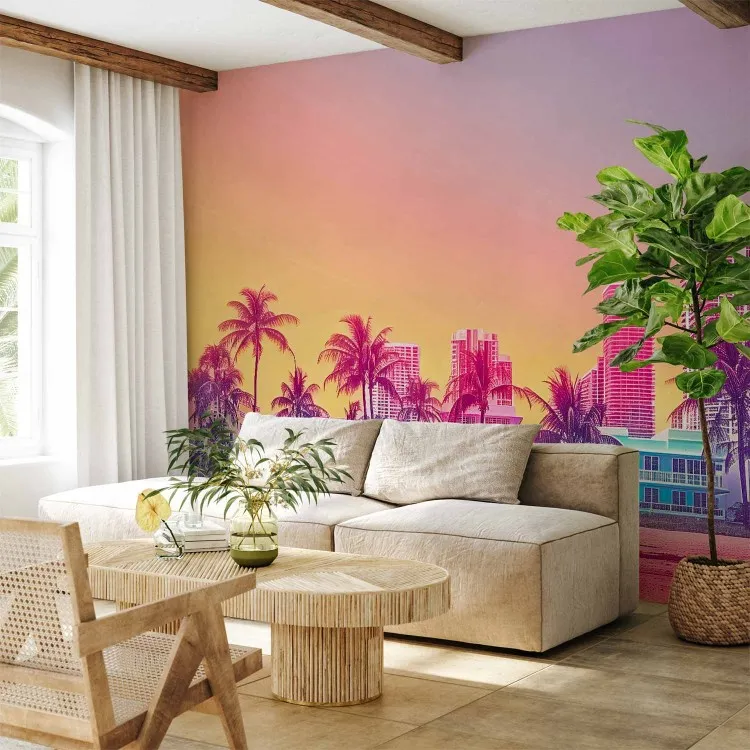 Sunset beach - colourful skyscrapers with palm trees and sand