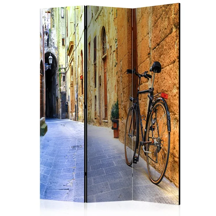 Italian Holidays - black bicycle against the backdrop of Italian city architecture